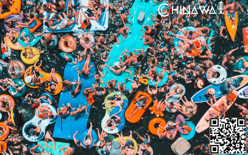 Огромную пляжную вечеринку в Ухане оправдали в китайских СМИ
